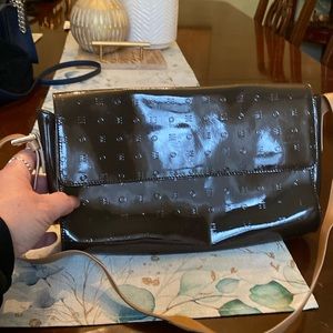 Arcadia embossed leather purse